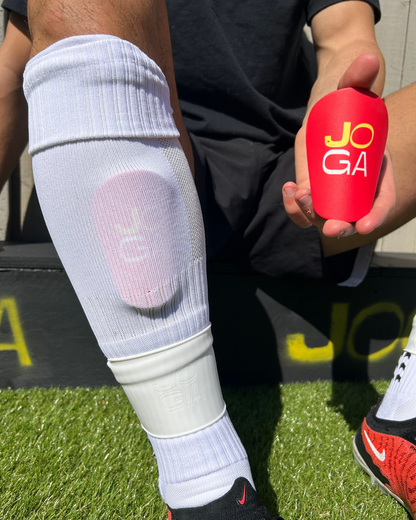 Shin pad Joga - rosso/bianco/giallo