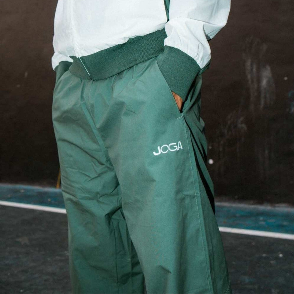 Brazil football tracksuit bottoms side view on model